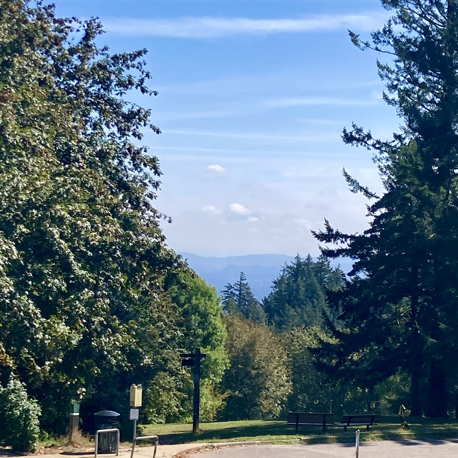 A sliver of Mt. Hood is visible between layers of “marine” clouds (actually low-altitude river effect clouds)