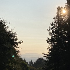 Mt. Hood barely visible at sunrise through haze from wildfires