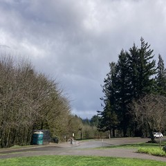 View from Council Crest Park toward Mt. Hood, which is obscured by the one heavy dark cloud that just dumped hail on me