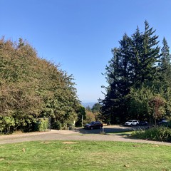 Hilltop with a commanding view across Portland under an utterly clear mid-October sky, but with just enough haze to completely obscure the mountain on the horizon