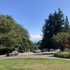 A credulous viewer might believe that mt hood is visible under the retreating marine layer and high altitude wildfire smoke clinging to the eastern horizon